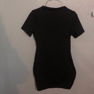 small, tight fitting black dress
